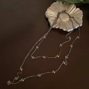 Black chain necklace with clear beads